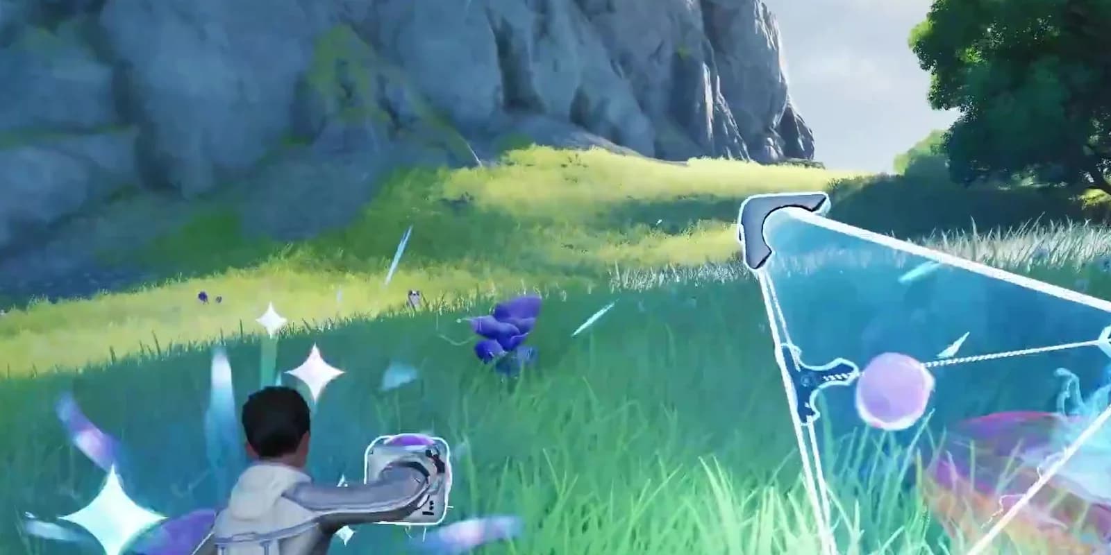 A Pathfinder holding an Aniipod with the catch cone open on a target across a sunlit meadow