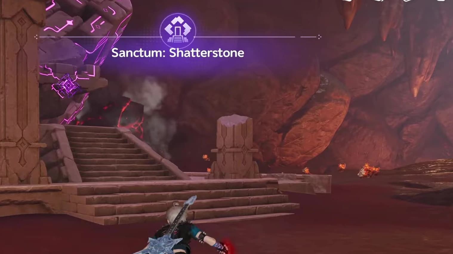 Shattering Stone entrance stairs beside a giant purple-glyph boulder inside the red Zephyrus Landbridge cavern