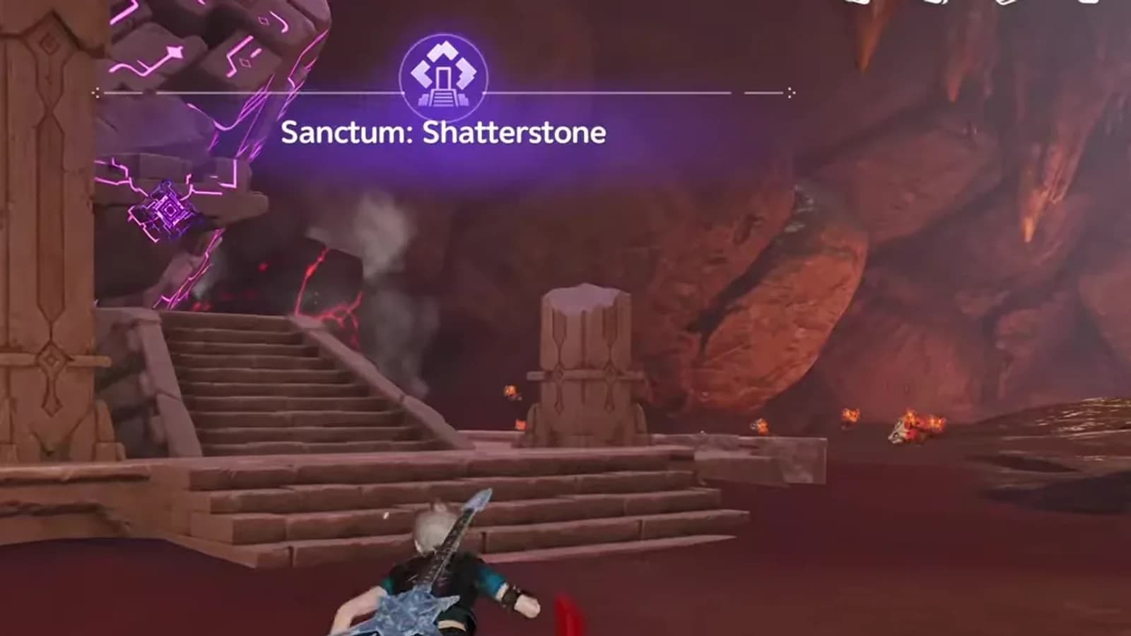 Shatterstone entrance stairs beside a giant purple-glyph boulder inside the red Zephyrus Landbridge cavern