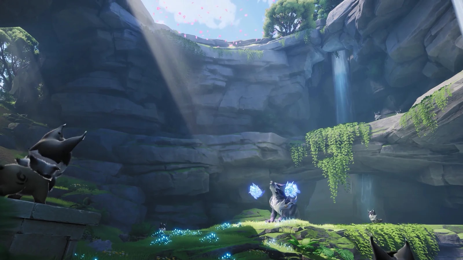 Dark Aniimo watching from a rock ledge as a pale wolf Aniimo raises blue flames on a mossy shelf in a sunlit gorge